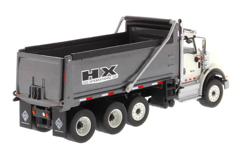 Load image into Gallery viewer, INTERNATIONAL - 1/50 - HX 620 DUMP TRUCK - WHITE CAB/GUN