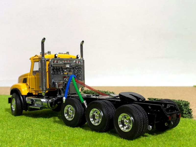 Load image into Gallery viewer, 1/50 - Mack Granite 8x4 Day Cab Tridem Tractor in Yellow

